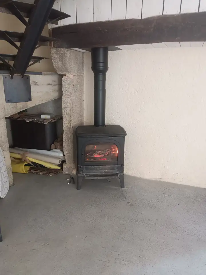 Remise aux normes d'un poêle à bois